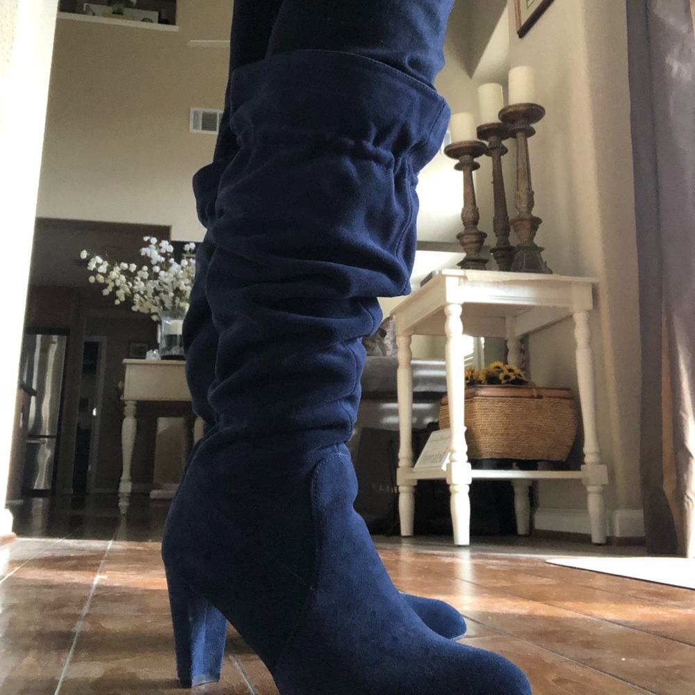 Navy heeled suede boots